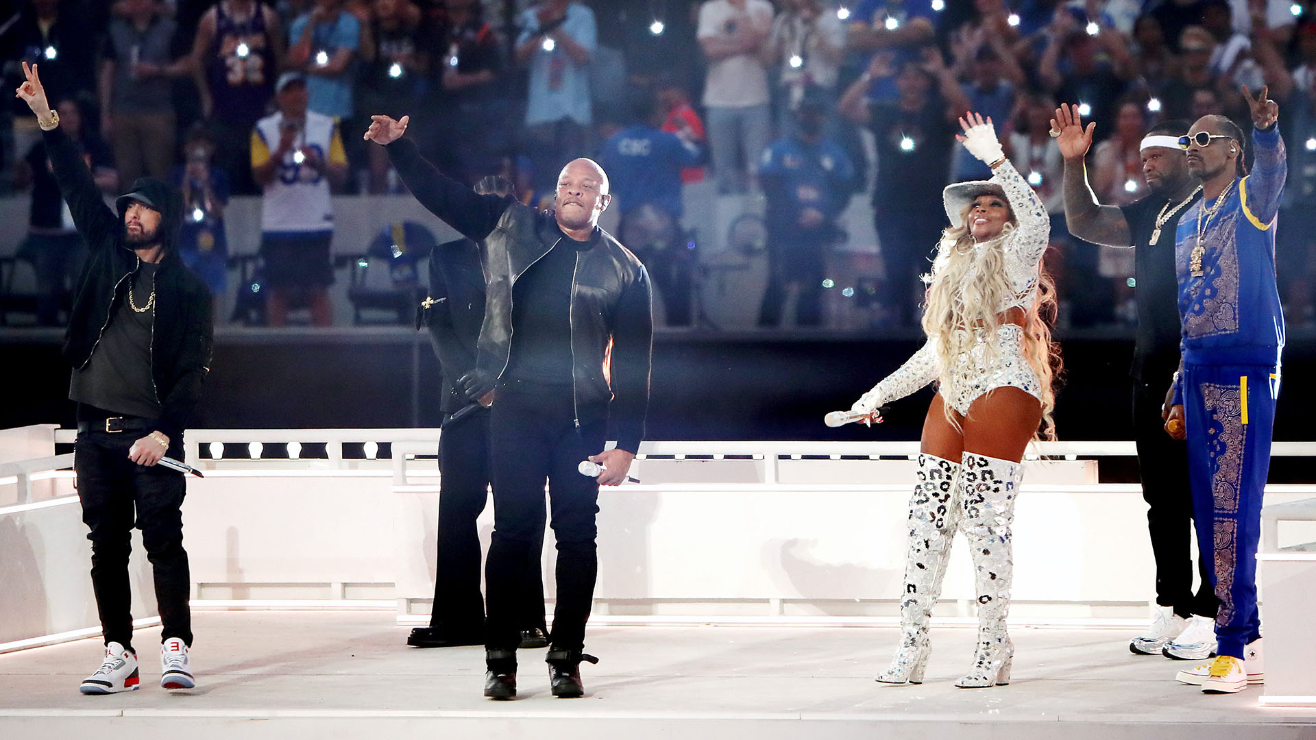 Eminem takes a knee during Super Bowl halftime performance