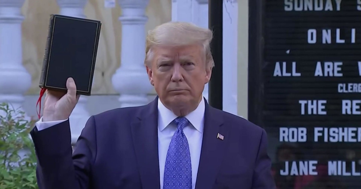 Trump stands in front of St. John's Church holding Bible ...